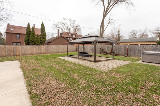 view of yard featuring a gazebo, a patio area, and a hot tub