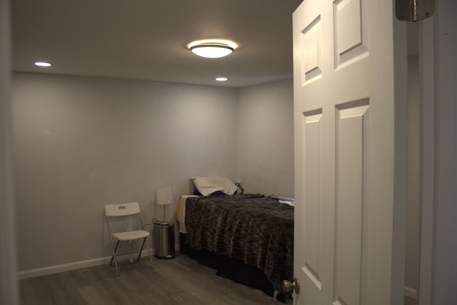 bedroom featuring dark hardwood / wood-style floors