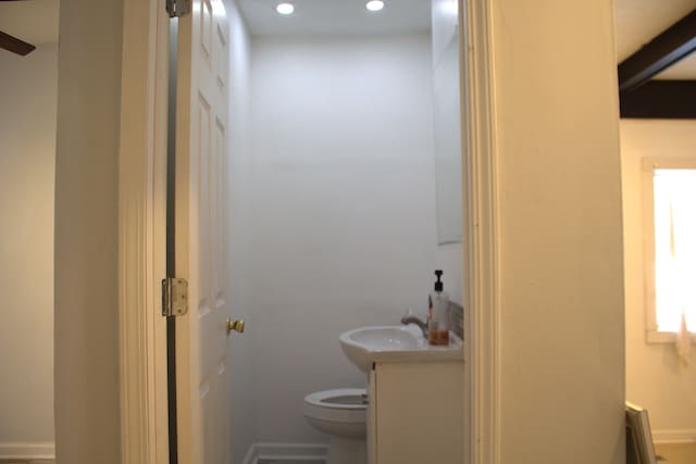 bathroom with vanity and toilet