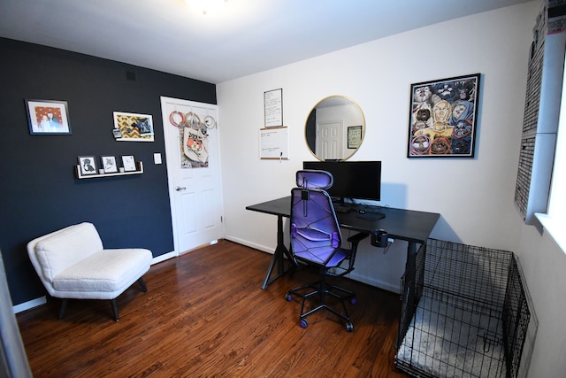 home office featuring dark hardwood / wood-style flooring