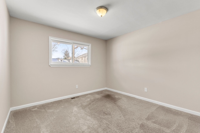 view of carpeted spare room