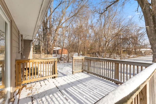 view of snow covered deck