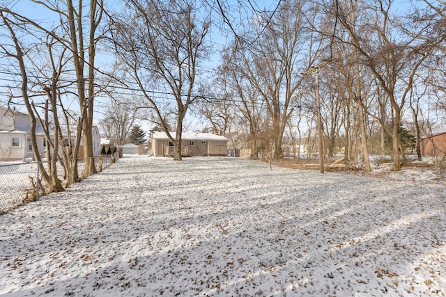 view of yard covered in snow