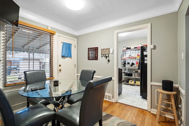 dining room featuring wood-type flooring