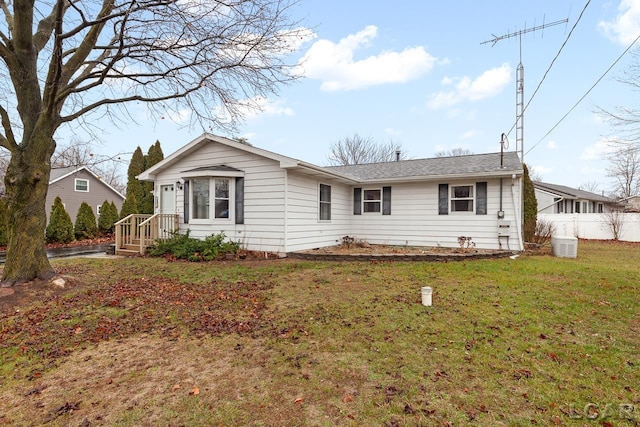 ranch-style home with a front yard