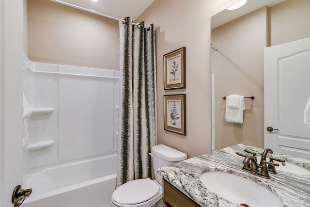 full bathroom with toilet, vanity, and shower / bath combo