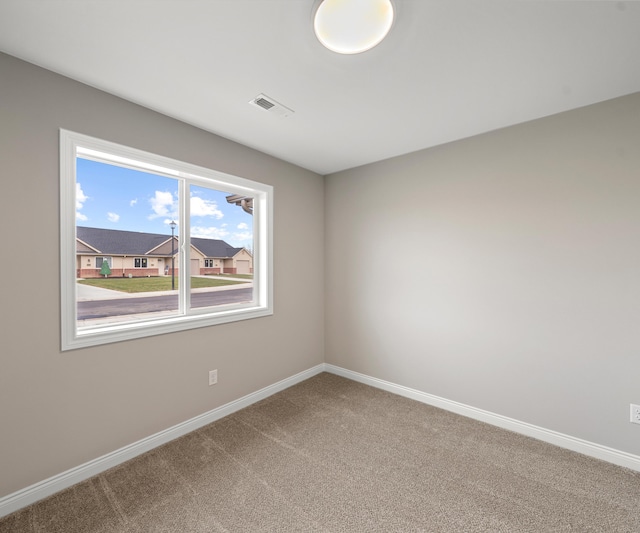 5405 Volterra Dr, Monroe, MI 48161 - spare room with carpet floors and baseboards