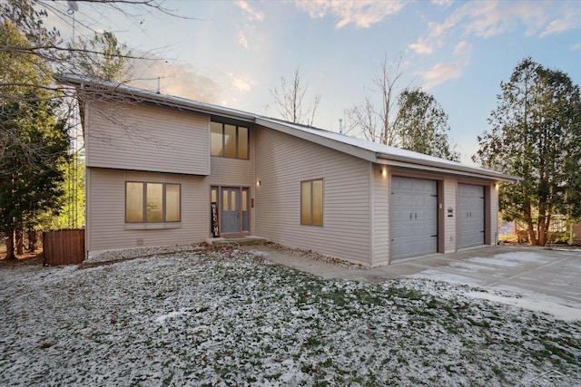 view of front of property with a garage