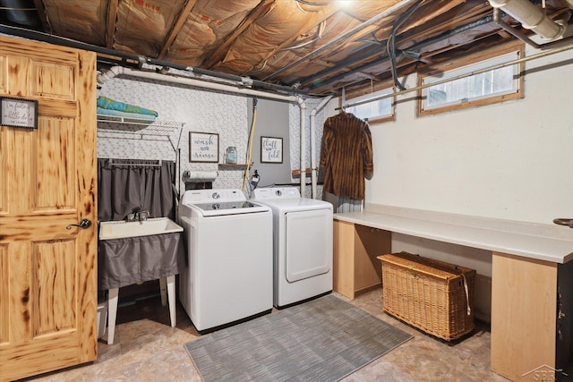 laundry room with washer and dryer