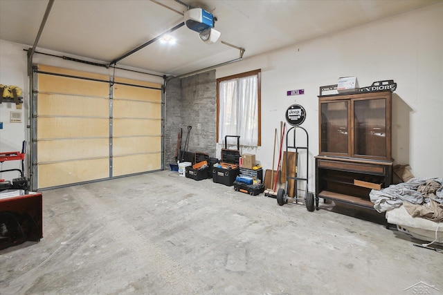 garage featuring a garage door opener