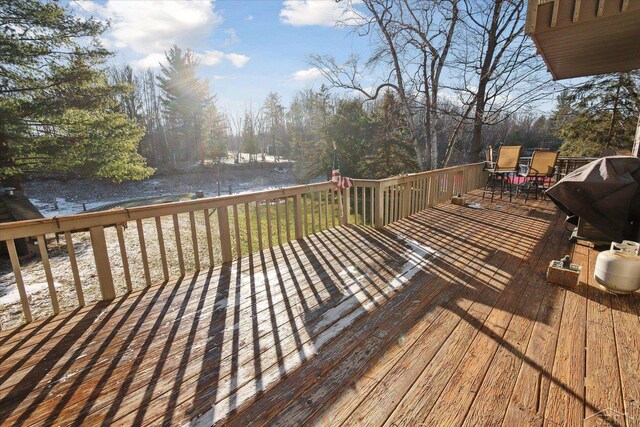 856 Pawtucket Dr, Hope, MI 48628 - wooden deck featuring grilling area and a water view