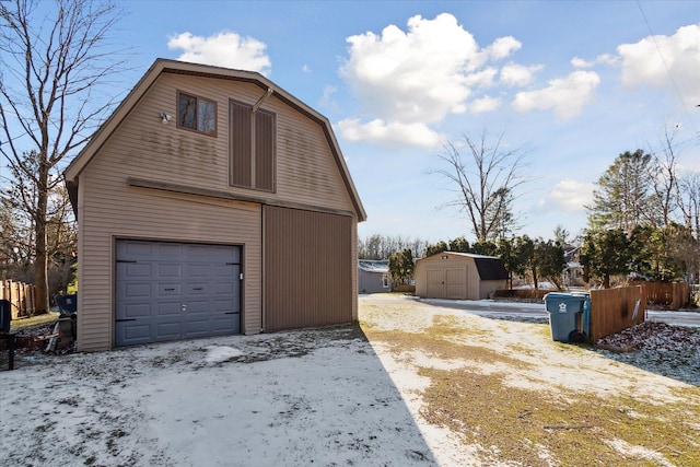 view of side of property featuring a storage shed