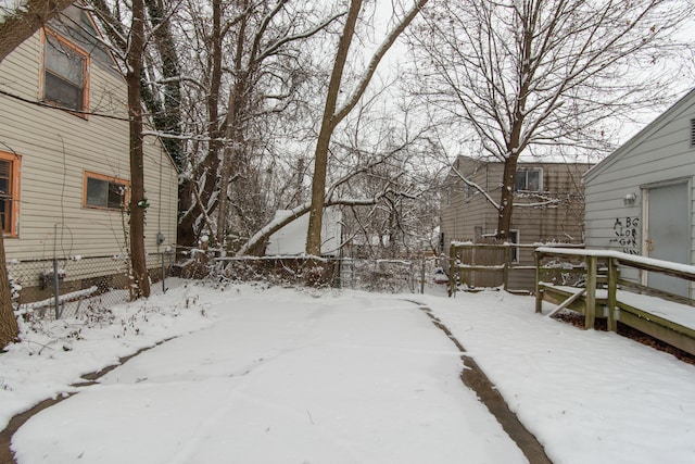 view of yard covered in snow