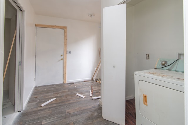 laundry room featuring dark hardwood / wood-style flooring and washing machine and dryer