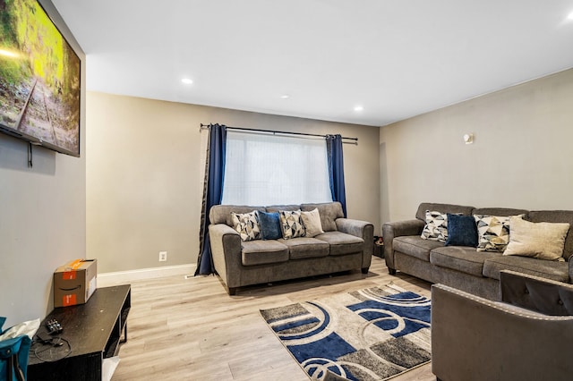 living room with light hardwood / wood-style floors