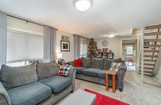 living room with light colored carpet