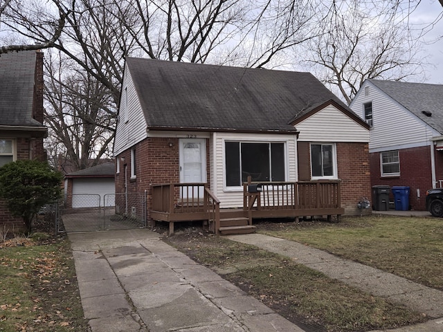 view of front facade with a garage and an outdoor structure