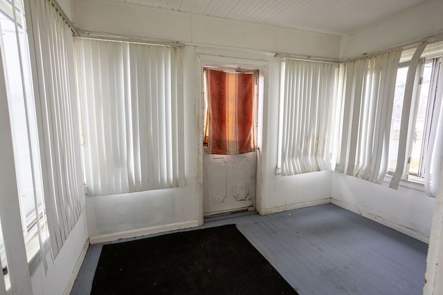 unfurnished sunroom with a healthy amount of sunlight