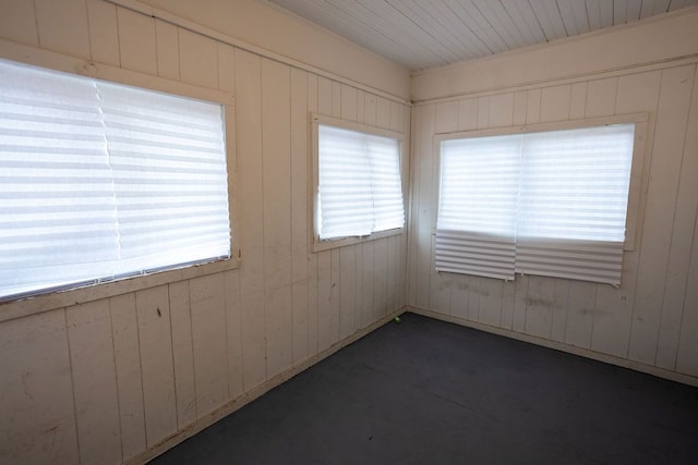 empty room with wooden walls