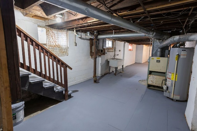 basement with sink and water heater