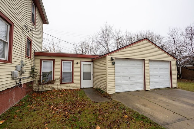 view of front of property with an outbuilding and a garage