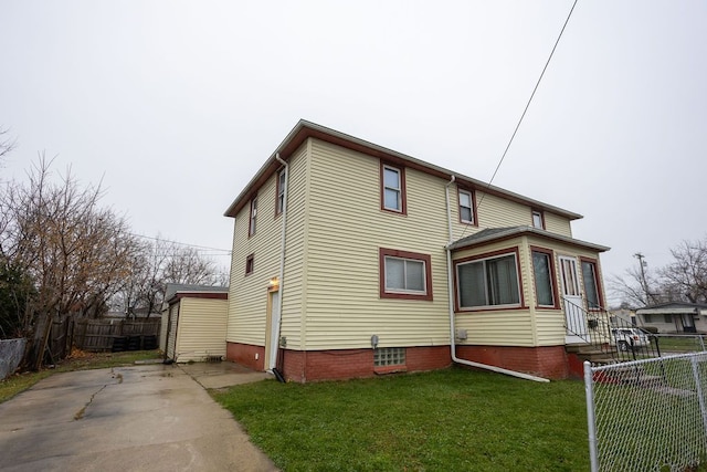 view of home's exterior featuring a yard