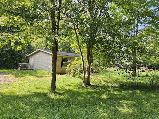 view of yard featuring a deck