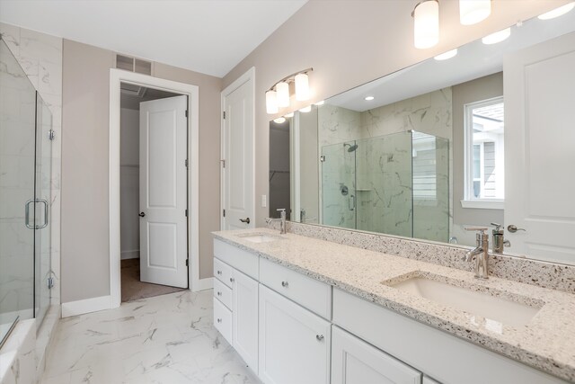 bathroom with vanity and walk in shower