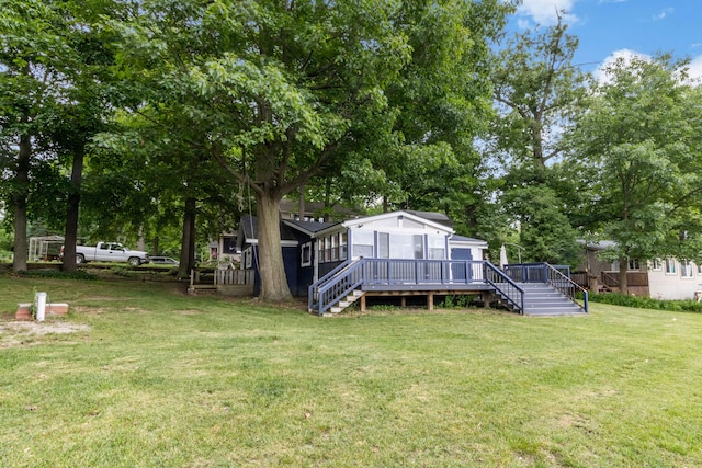 view of yard with a deck