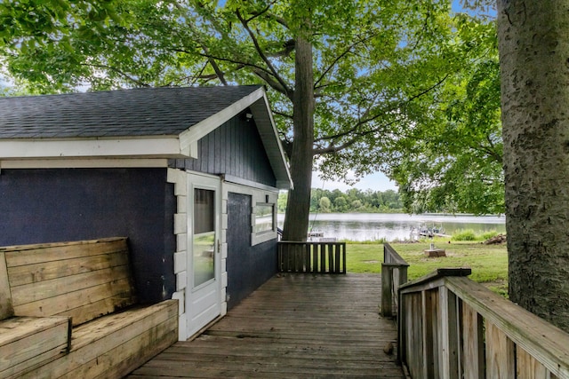 wooden deck with a water view