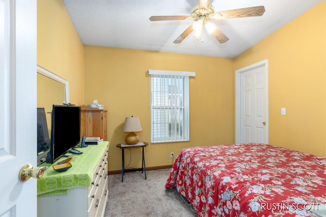 2008 Parker Dr, Wayland, MI 49348 - bedroom with baseboards, a ceiling fan, and light carpet