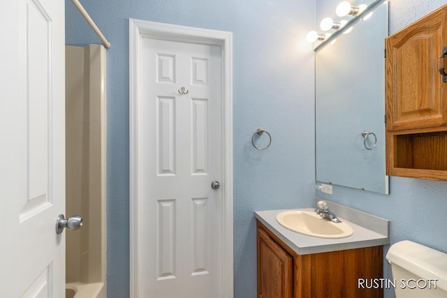 2008 Parker Dr, Wayland, MI 49348 - full bathroom featuring toilet and vanity
