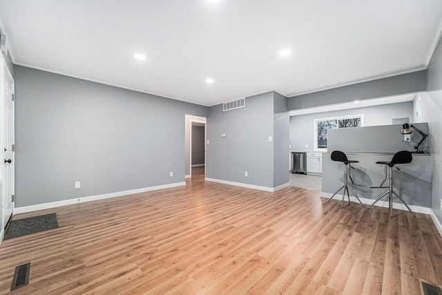 living room with light hardwood / wood-style flooring