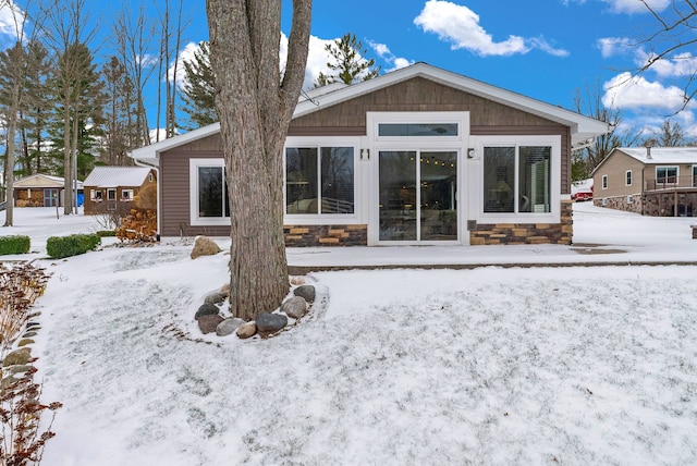 1571 Loebrich Dr, Gladwin, MI 48624 - view of snow covered house