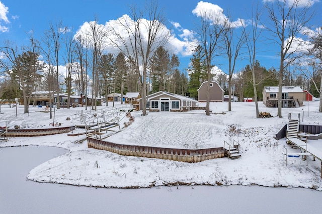 view of yard covered in snow