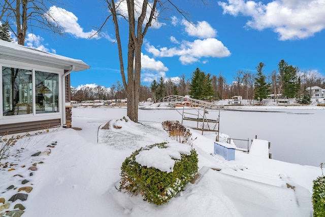 view of yard covered in snow