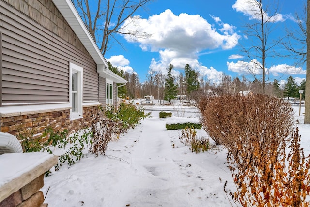 view of snowy yard