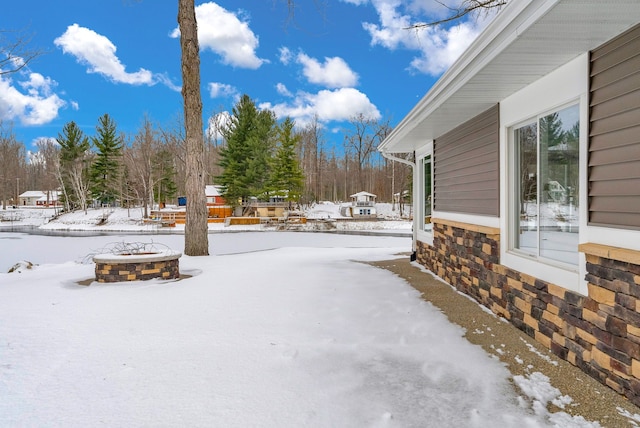 view of yard covered in snow