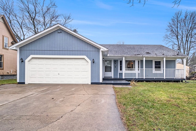 single story home with a front lawn, covered porch, and a garage