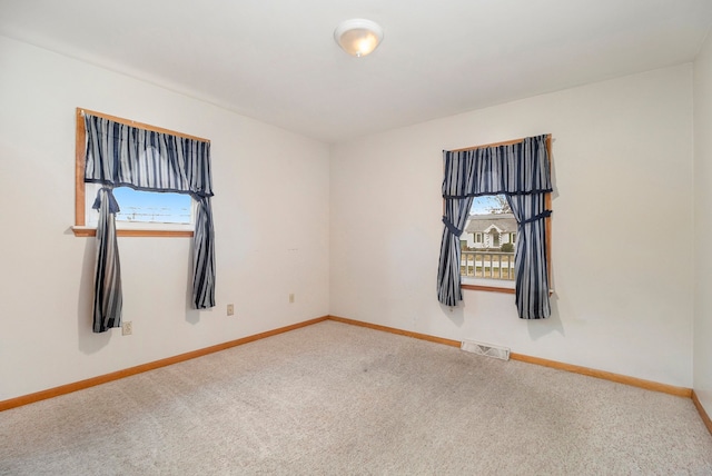 view of carpeted spare room