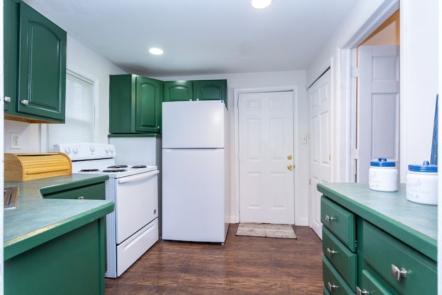 kitchen with dark hardwood / wood-style flooring, white appliances, and green cabinetry