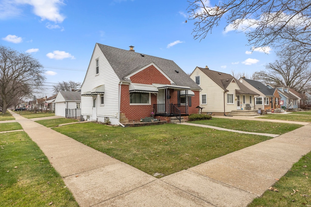 bungalow with a front yard