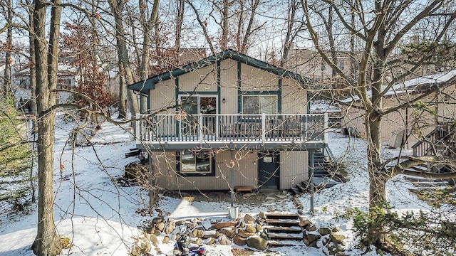 view of front of property with a wooden deck