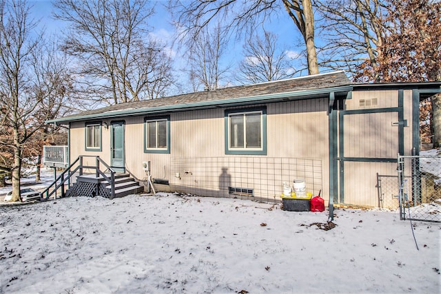 view of snow covered property