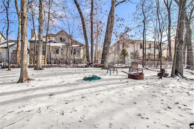 view of yard layered in snow