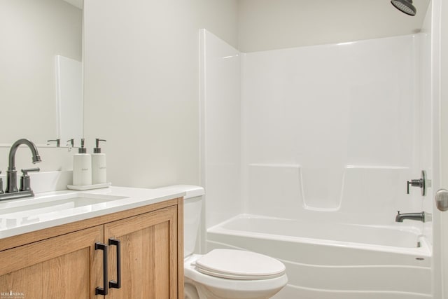 full bathroom featuring shower / tub combination, vanity, and toilet