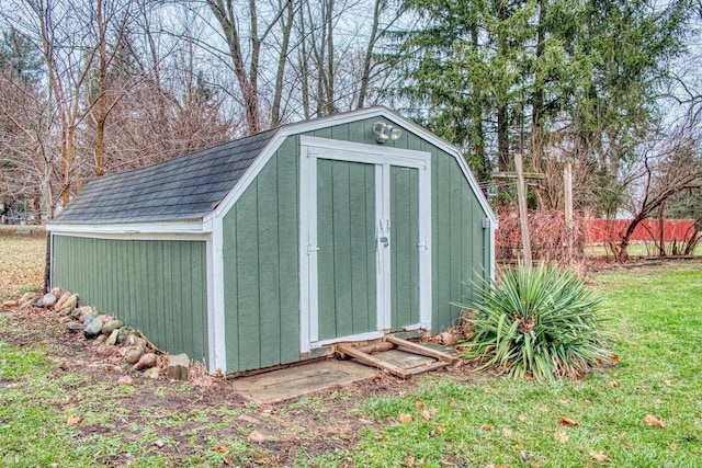 view of outdoor structure with a yard