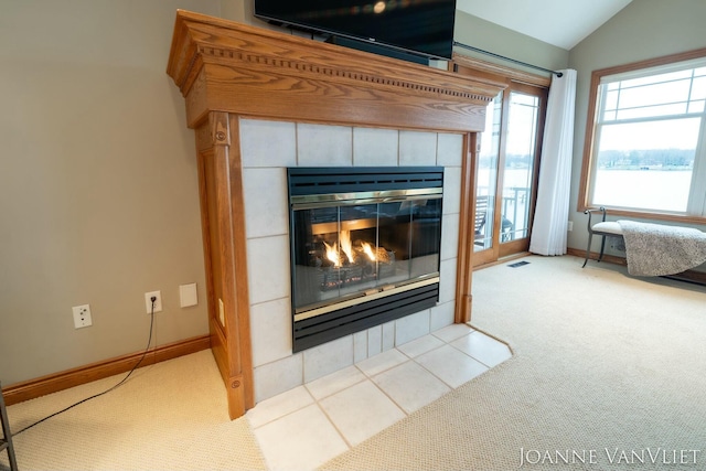585 Crescent Dr, Holland, MI 49423 - details featuring a fireplace, carpet, visible vents, and baseboards