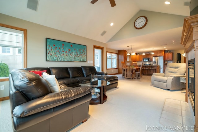 585 Crescent Dr, Holland, MI 49423 - living area featuring recessed lighting, a ceiling fan, high vaulted ceiling, and light carpet