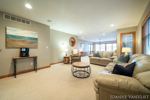 585 Crescent Dr, Holland, MI 49423 - living area featuring visible vents, baseboards, recessed lighting, and carpet